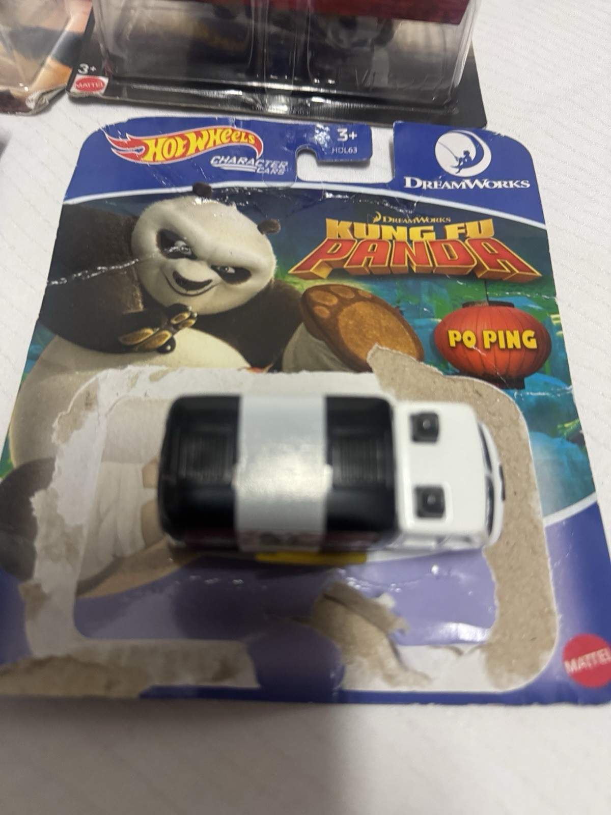 hot wheels mix lot of 4- see photos please-damaged package-new never used