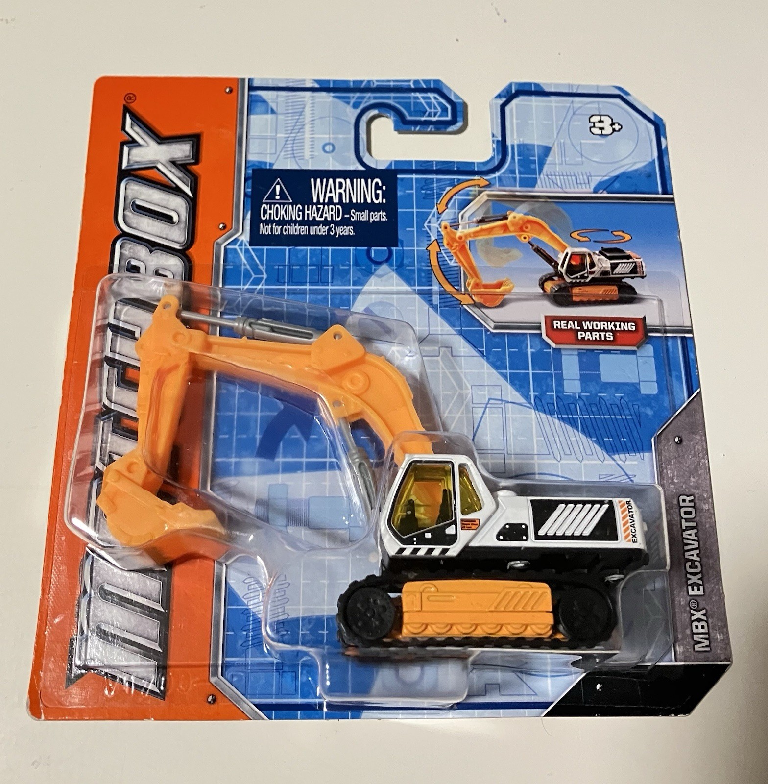 New 2012 Mattel Matchbox Real Working Parts MBX Excavator W6875