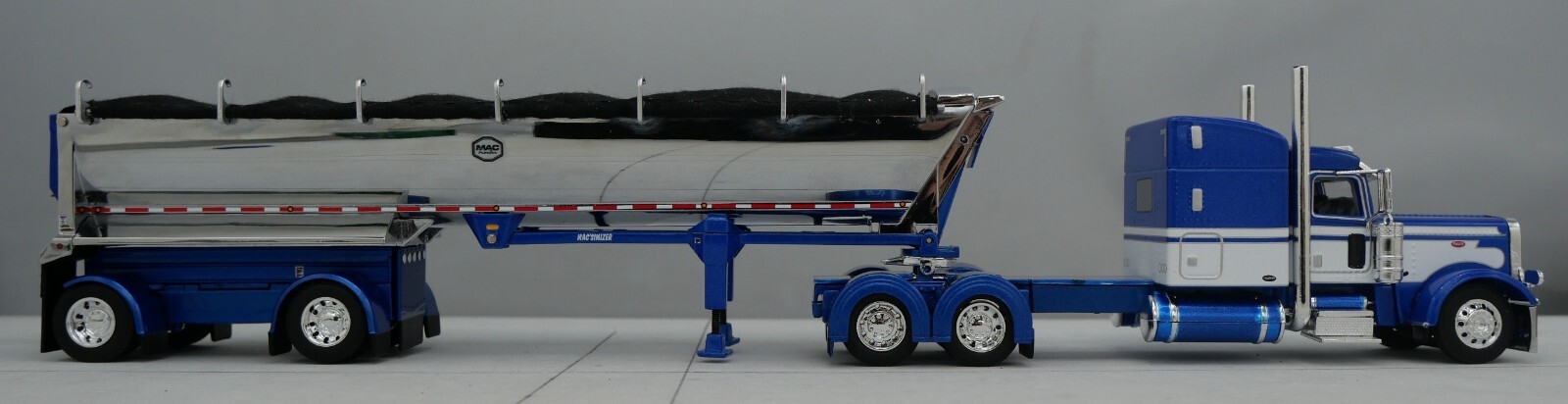 DCP 1/64 Blue White Peterbilt 389 Mac Spread Axle Round Dump Trailer 60-1740