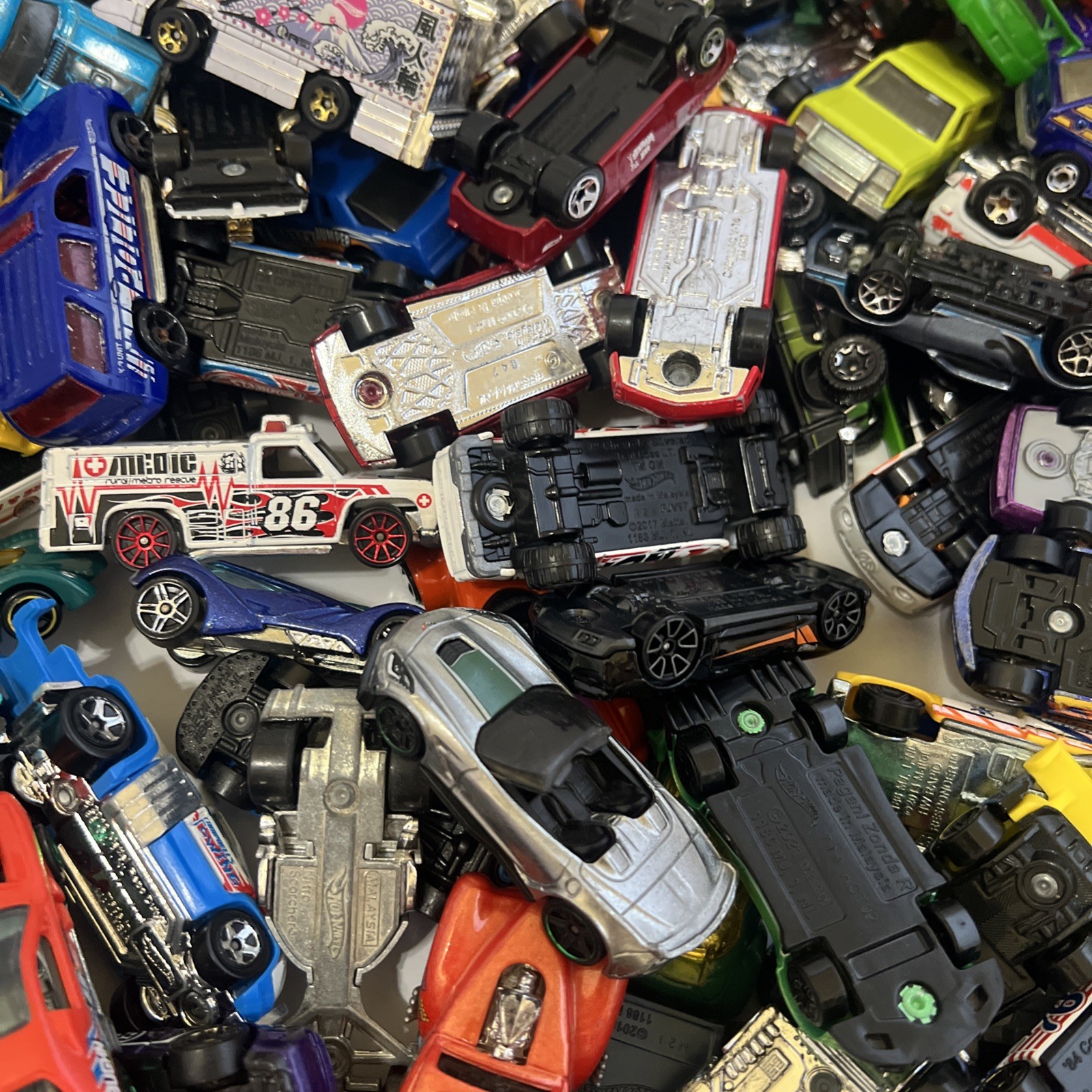 30 LBS Pounds of pure hotwheels. There are many different years and castings.