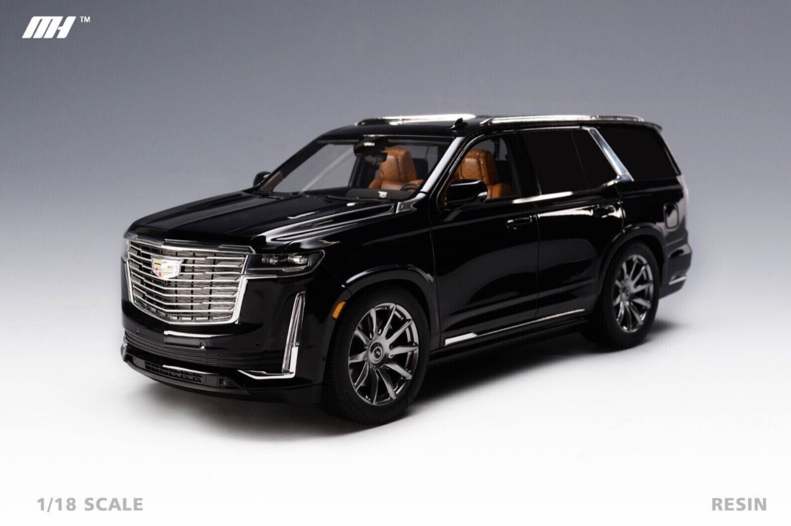 1/18 Motorhelix Cadillac Escalade 2022 in Gloss Black on Carbon Base