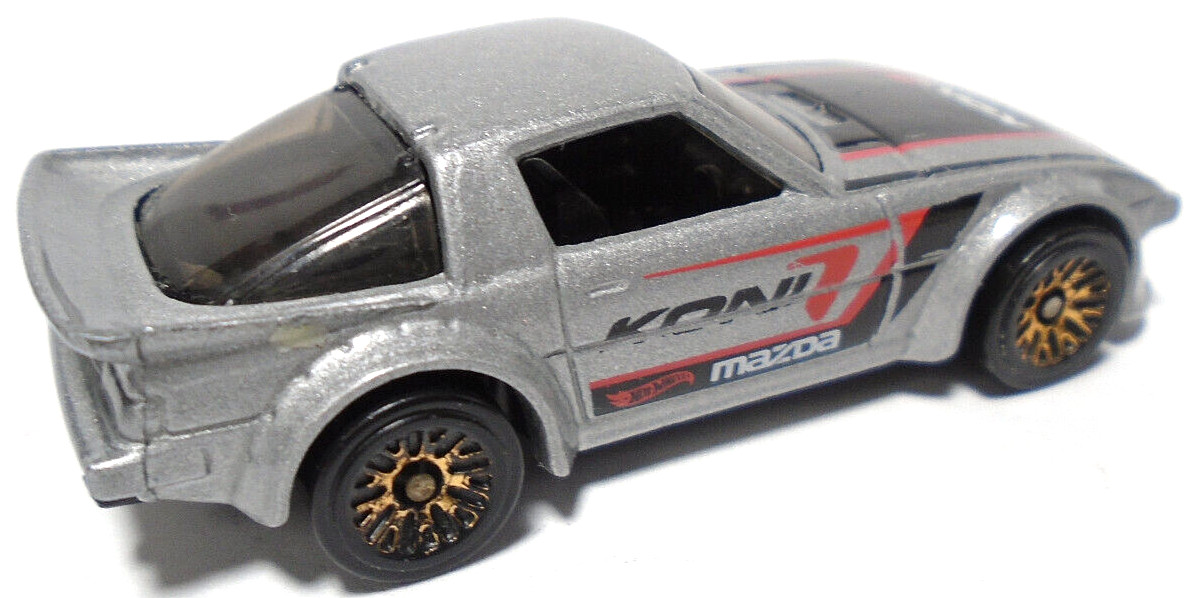 2011 HOT WHEELS MAZDA RX-7 KONI SILVER 2 5/8″ DIECAST RACE CAR WITH BLACK & RED