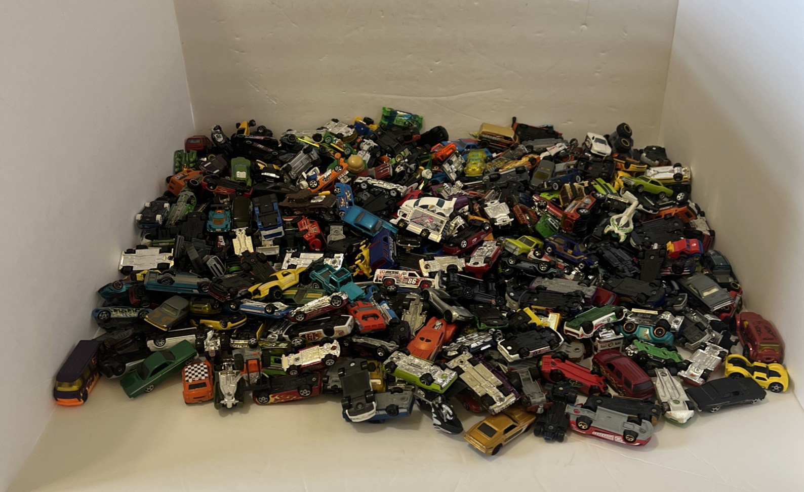 30 LBS Pounds of pure hotwheels. There are many different years and castings.