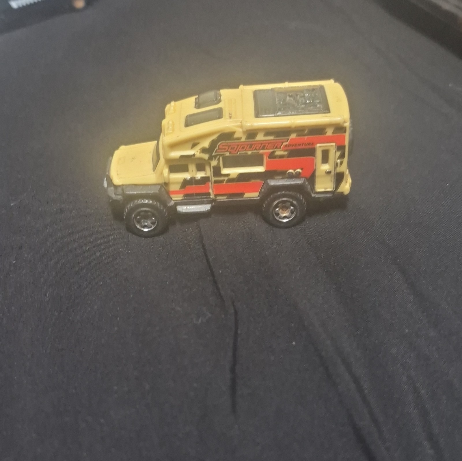 Matchbox Tan Diecast Off-Road Truck Toy Vehicle w/ Red & Black Graphics