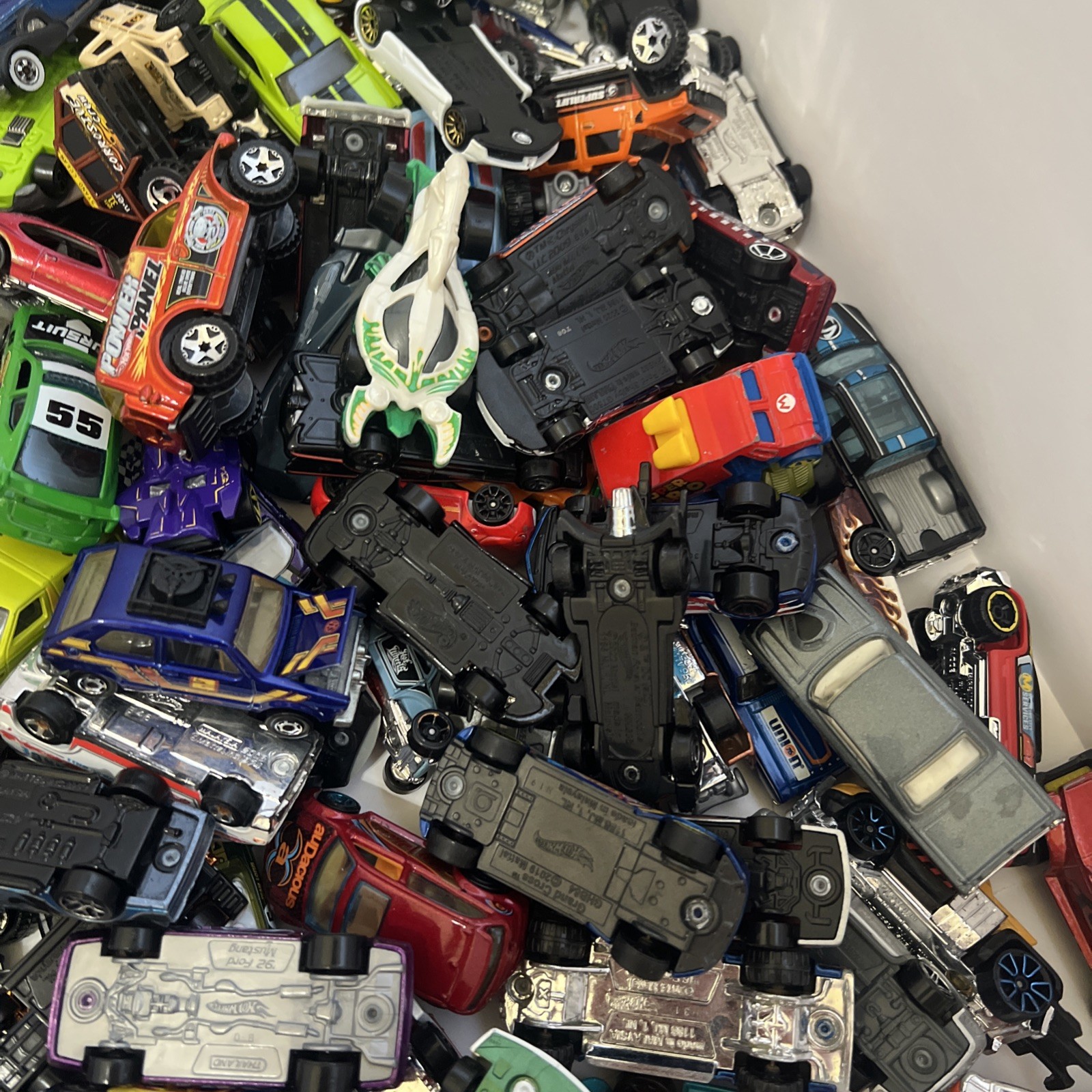 30 LBS Pounds of pure hotwheels. There are many different years and castings.
