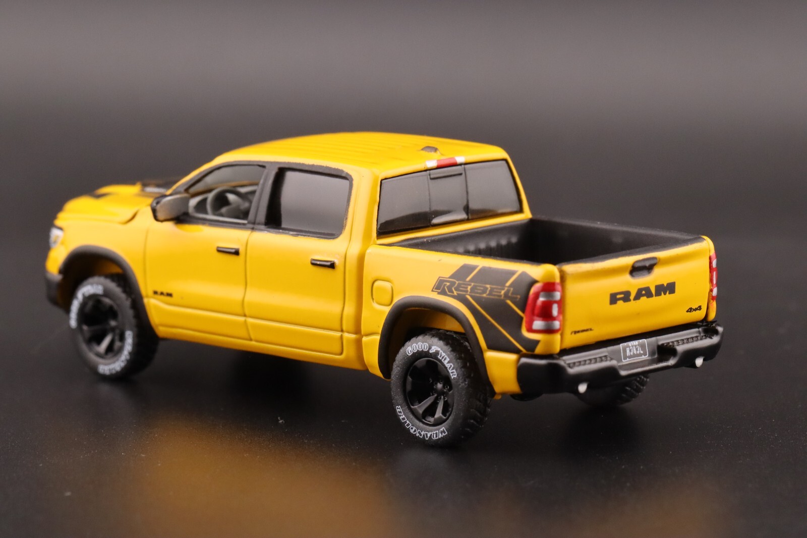 Auto World 2023 Dodge Ram Rebel Havoc Edition Baja Yellow AWSP164 A 1/64