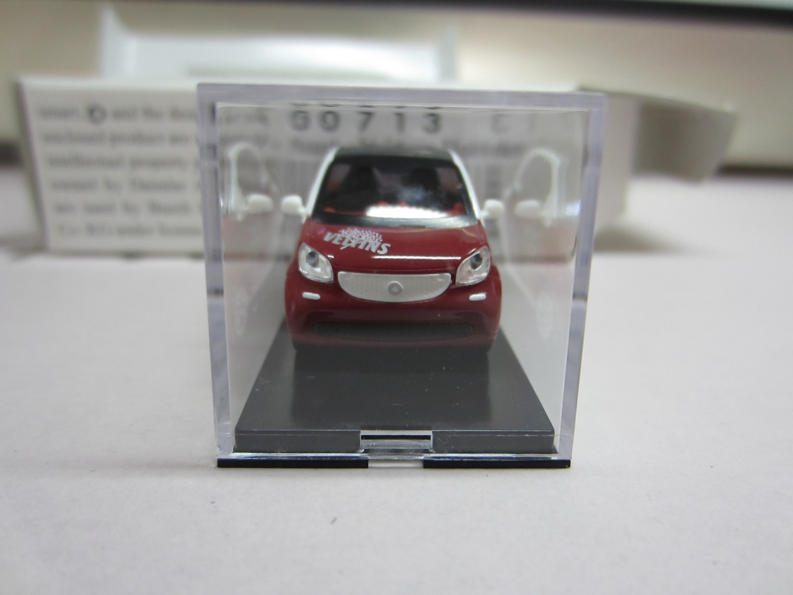 BUSCH 50713 SMART FORTWO COUPE 2015 VELTINS – model is PLASTIC – HO / 1:87 scale