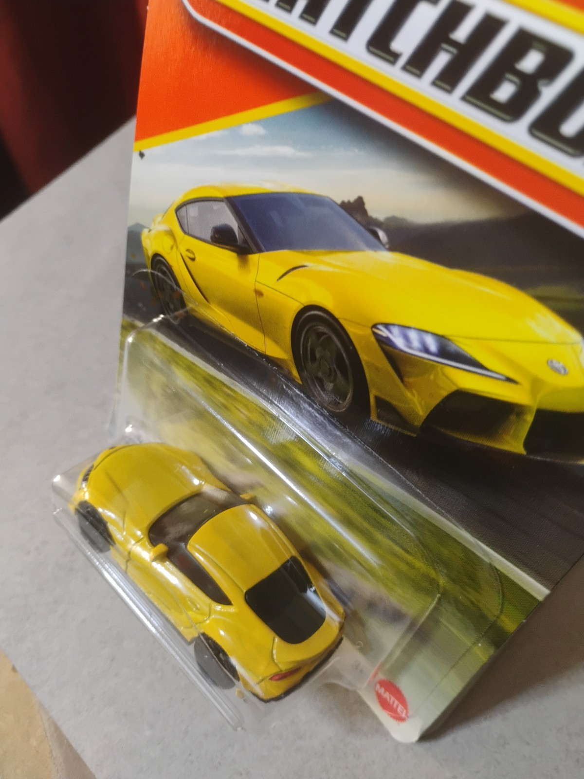 Blue And Yellow 2023 Toyota Gr Supra Matchbox 164 Scale