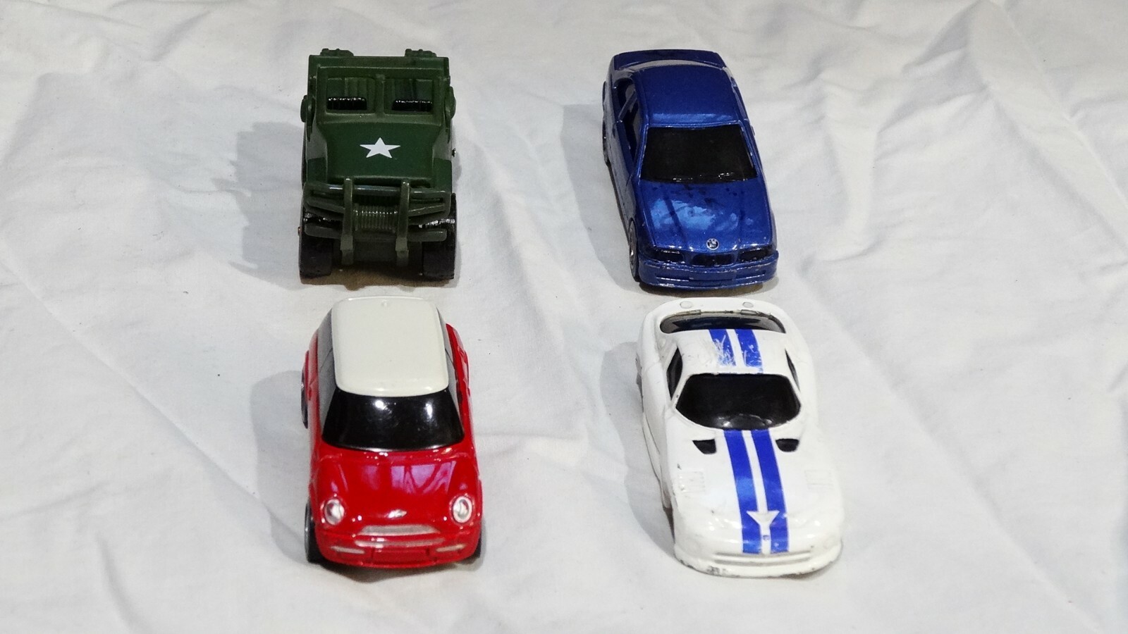4 Diecast Maisto lot. In fair condition, Please see photos 