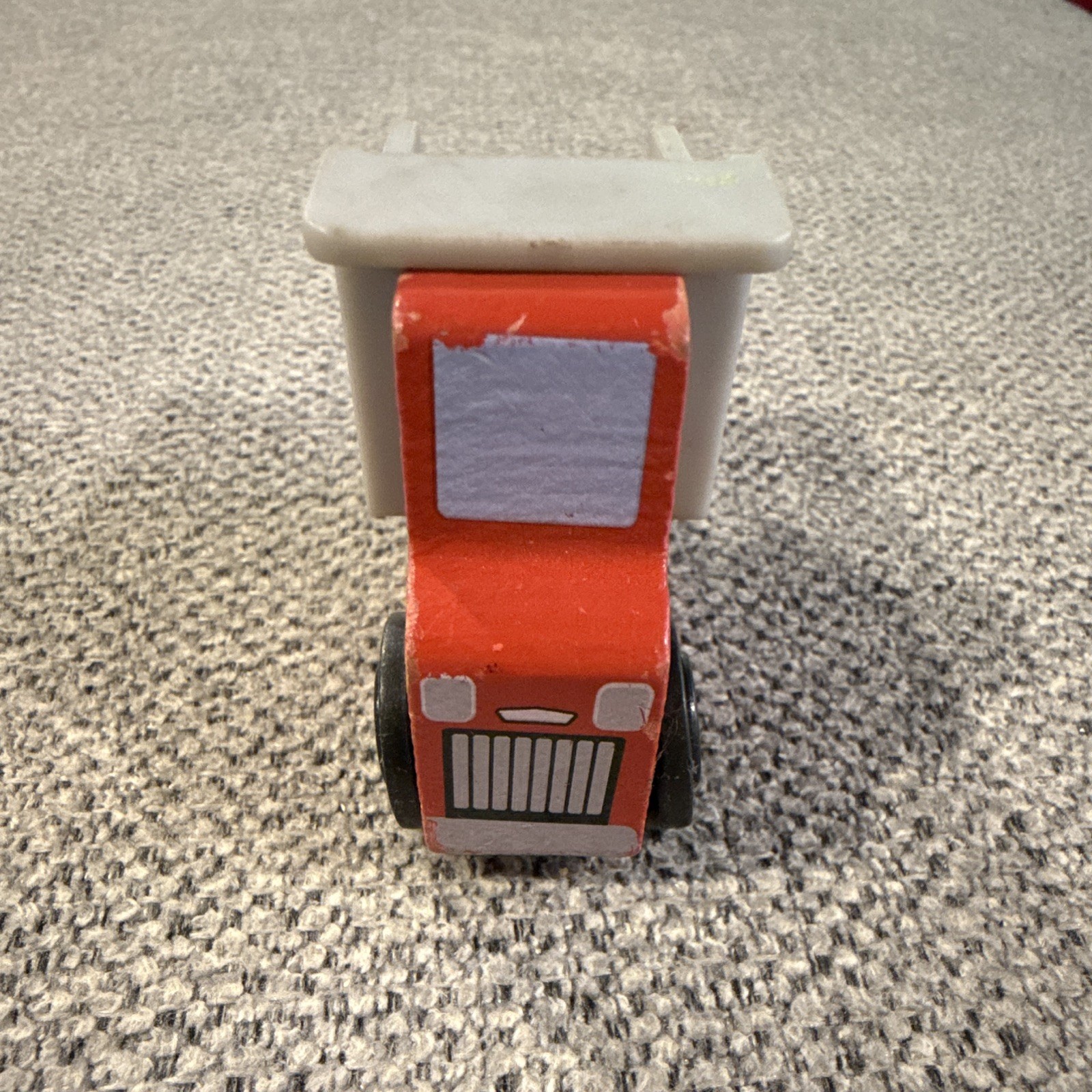 Snap-on Red Wooden dump truck with a Gray plastic dump bed.
