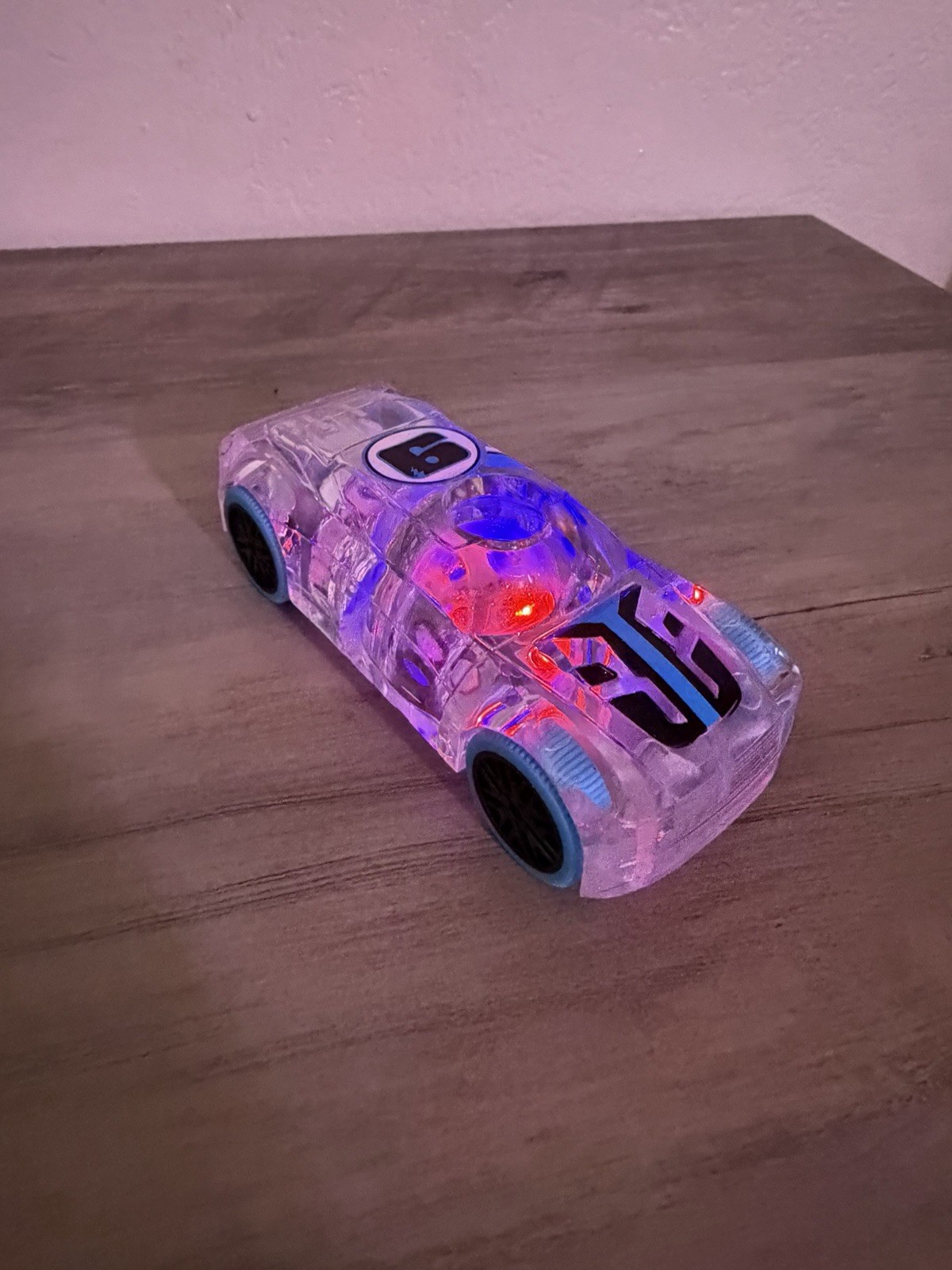 Clear Plastic Light-Up Toy Car with Blue Wheels, Ages 3+, Boys & Girls