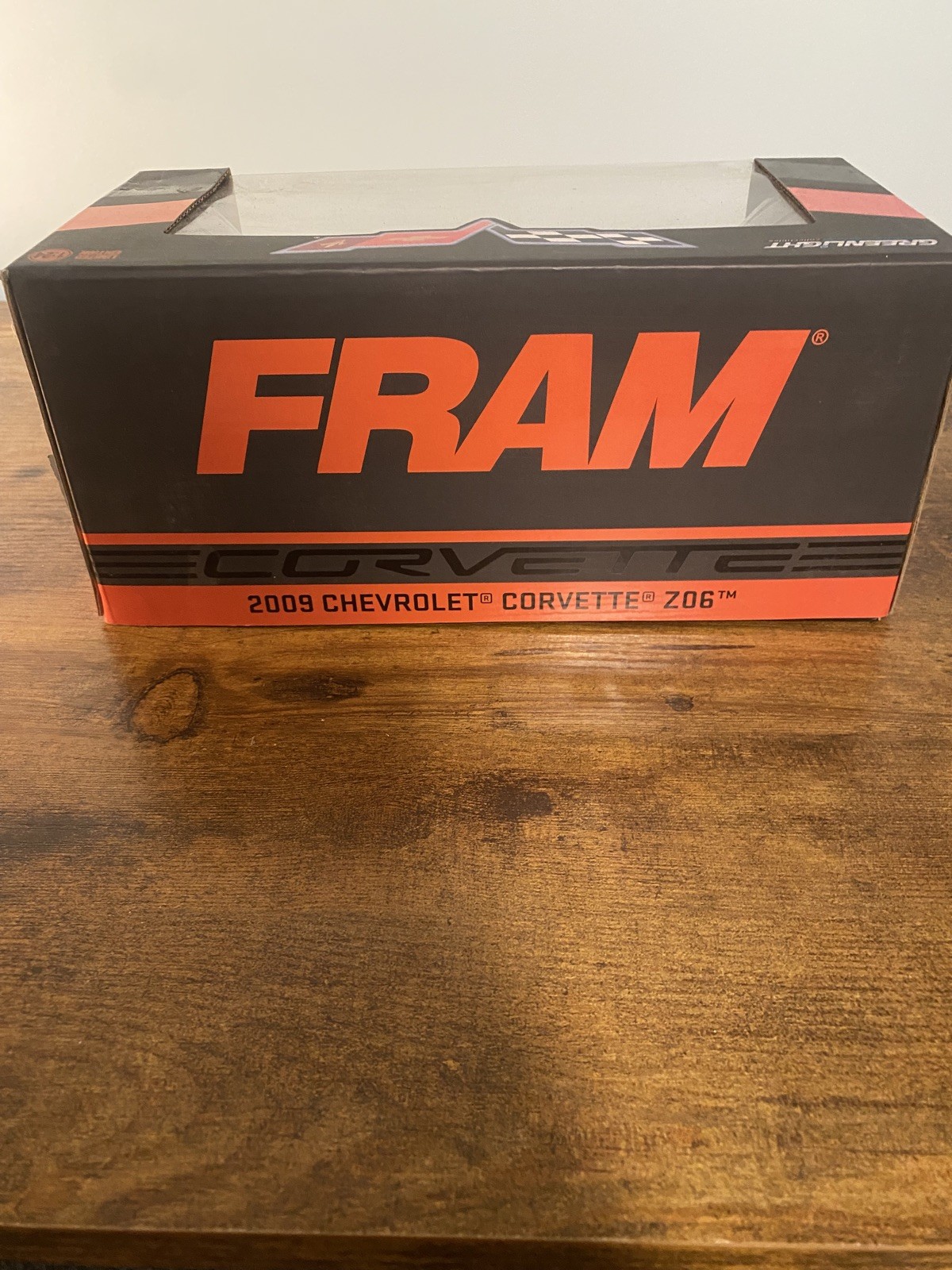 1/24 GREENLIGHT FRAM OIL 2009 CHEVROLET CORVETTE Z06 BLACK W/ORANGE STRIPS