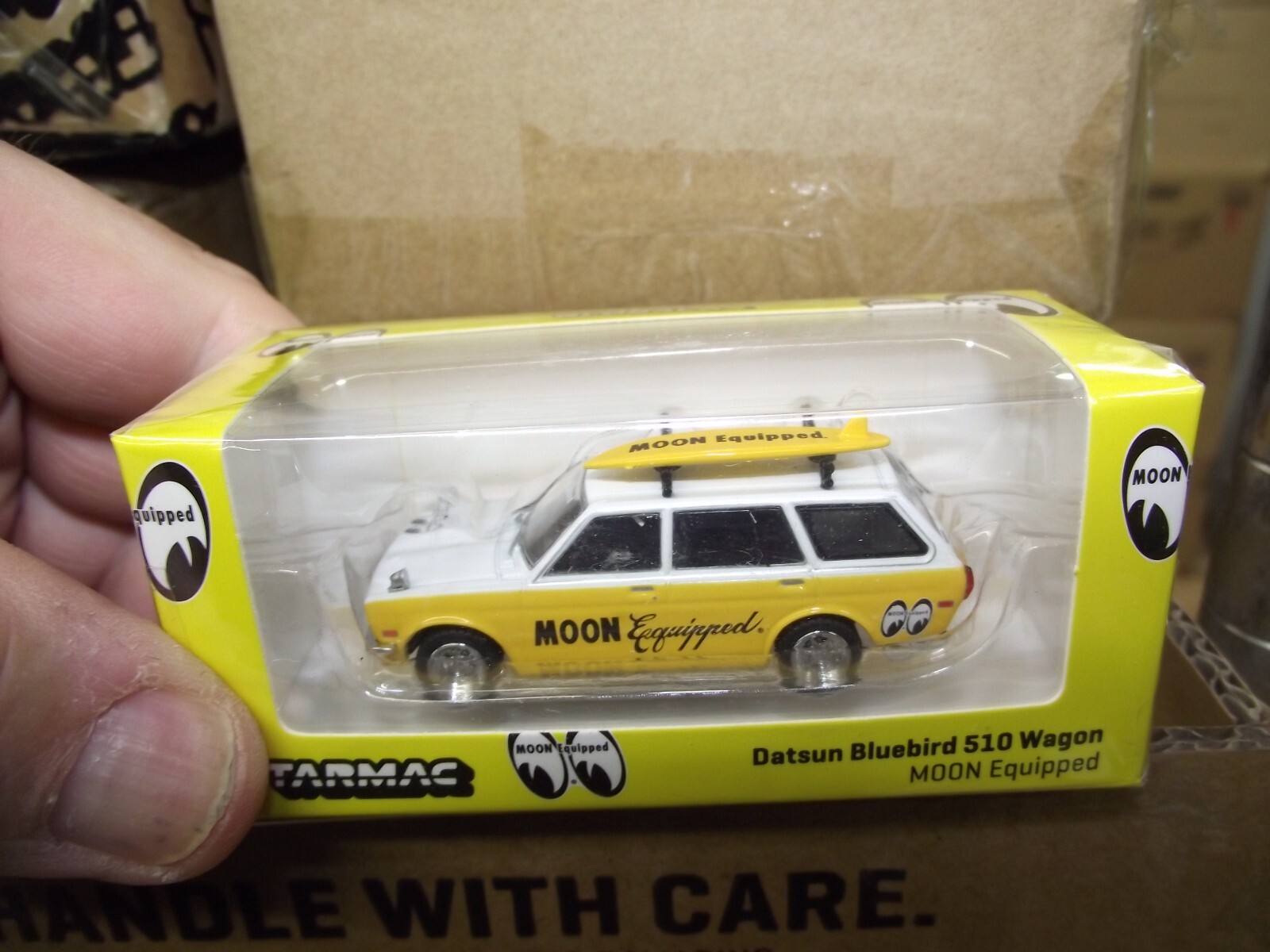Tarmac 1/64 Mooneyes Datsun Bluebird 510 wagon yellow & white NIB
