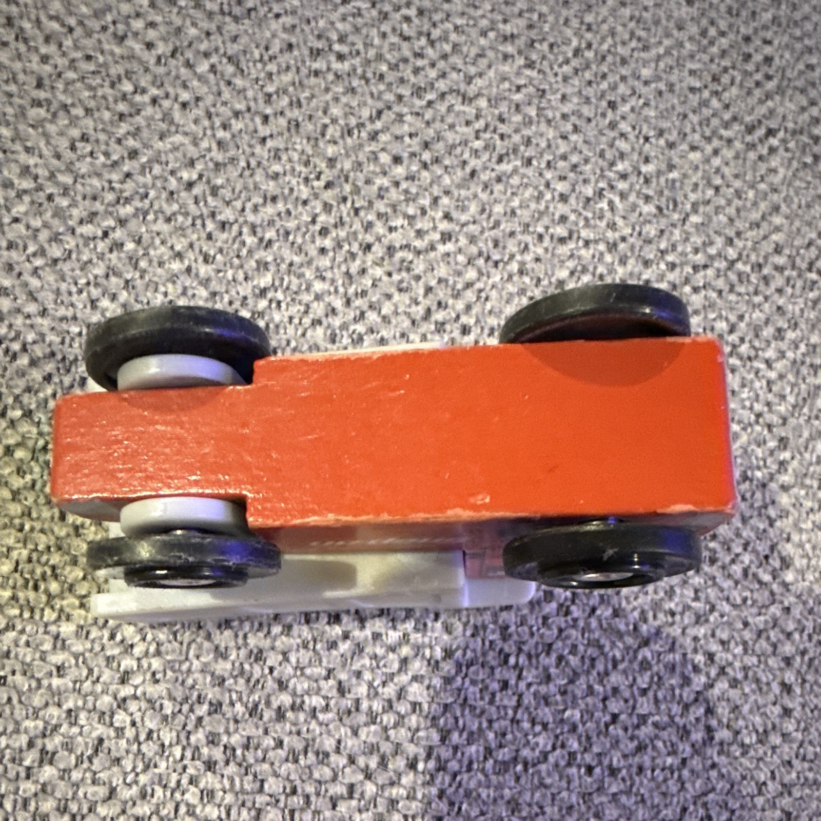 Snap-on Red Wooden dump truck with a Gray plastic dump bed.