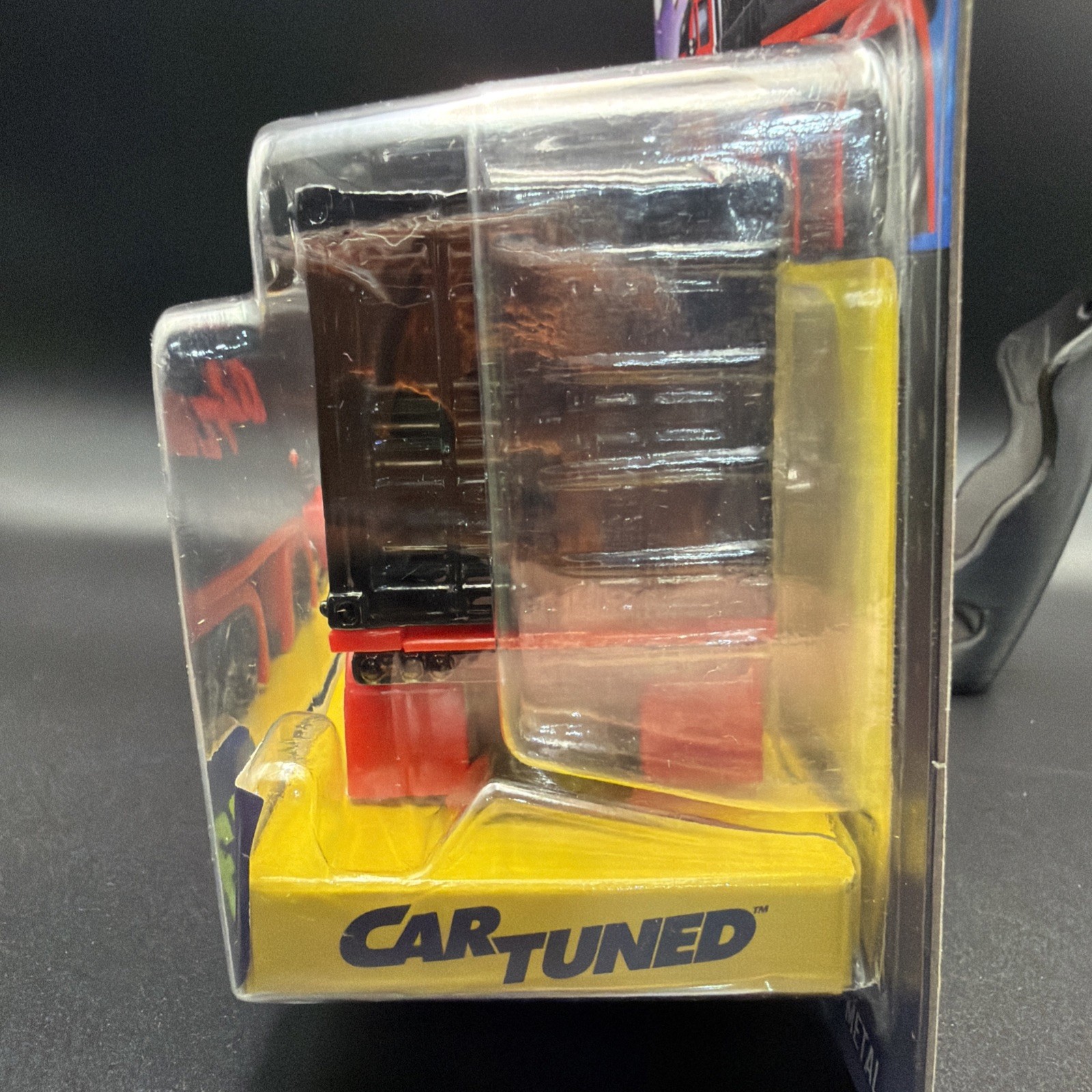 Car Tuned RIGS Series 3 – Sneaky Pete Container #03 – Red W/ Black Container