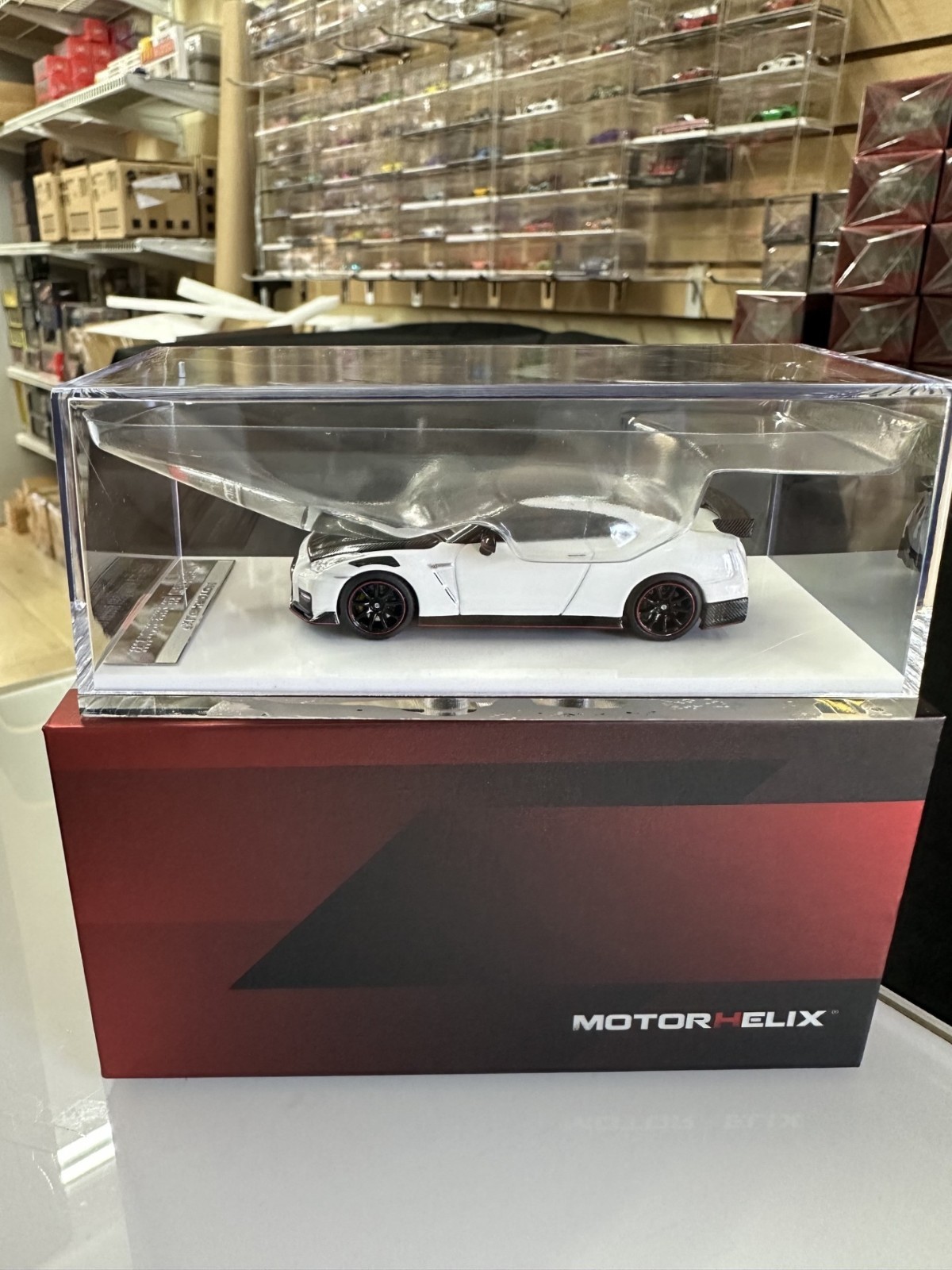 NISSAN SKYLINE GT-R R35 NISMO CARBON WHITE HOOD OPEN 1/64 CAR BY MOTORHELIX MH