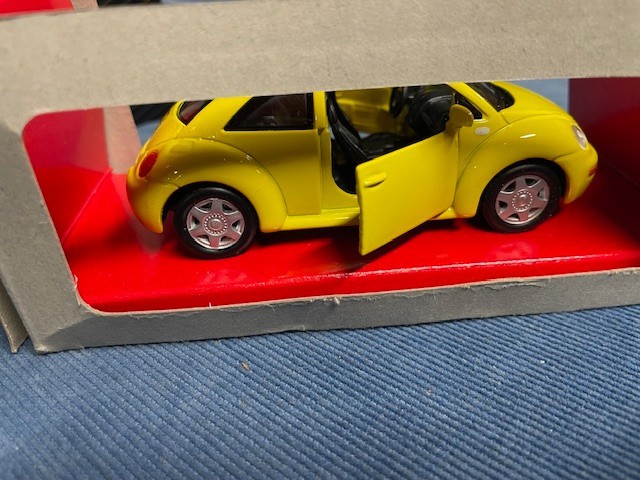 Lot of 2 diecast VW Beetles. One is Maesto other is Kinsmart 1/32 Scale