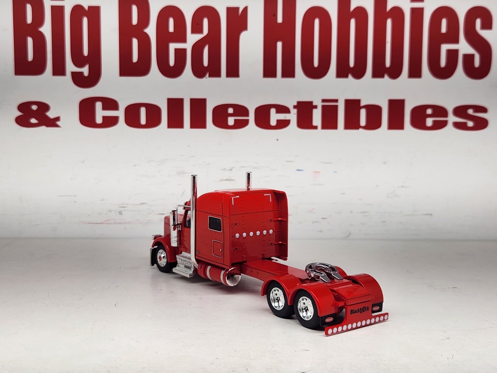 1/64 New DCP Red 589 Peterbilt 70″ Midroof Sleeper Blackjack