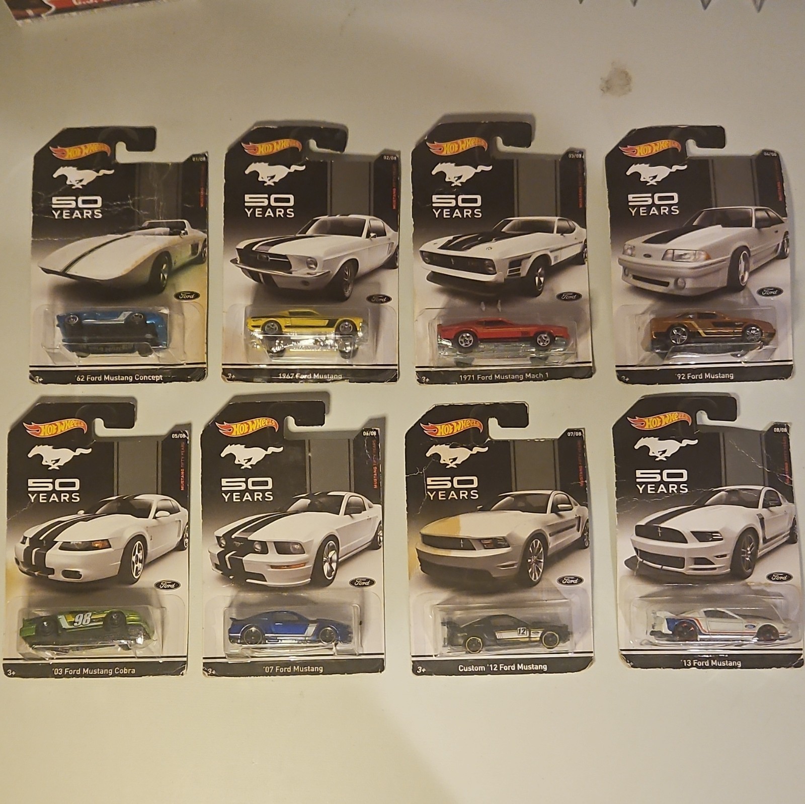 Hot Wheels 50 Years of Mustang Set of 8 SEALED (Damaged Cards)