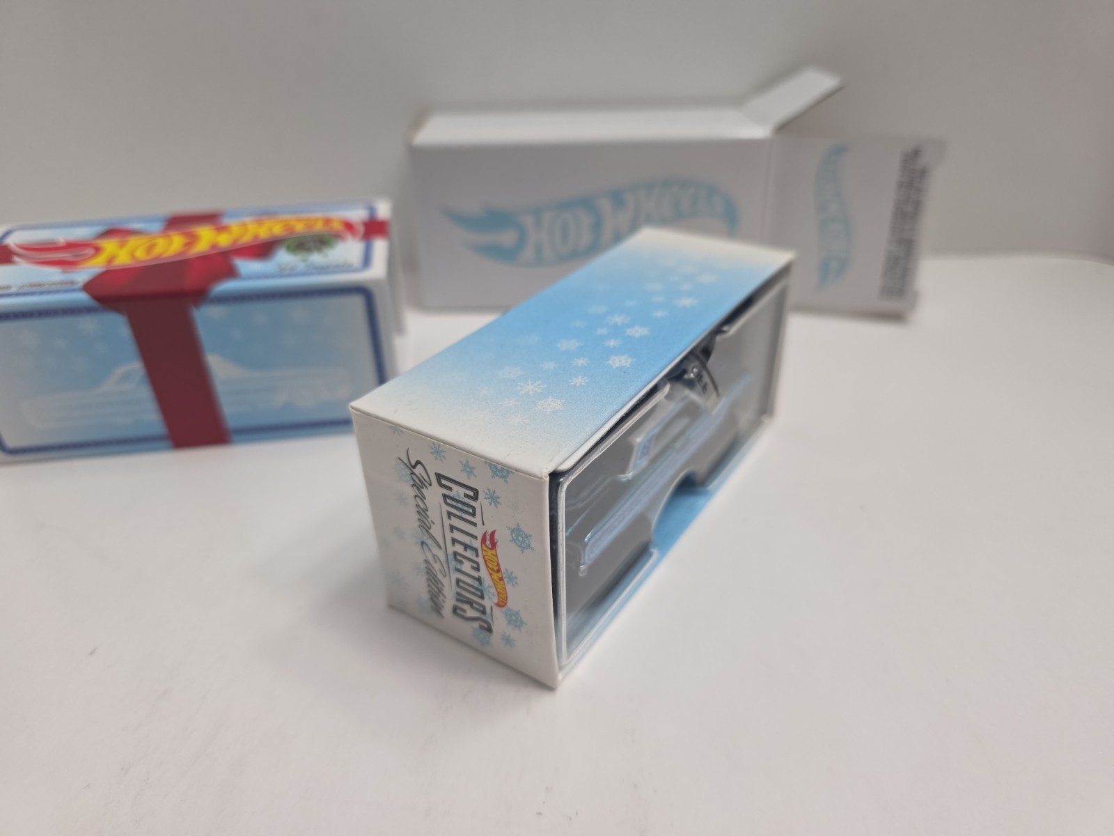 Hot Wheels 2021 RLC Holiday Snowman Chevy ’64 Impala – Spectraflame Light Blue