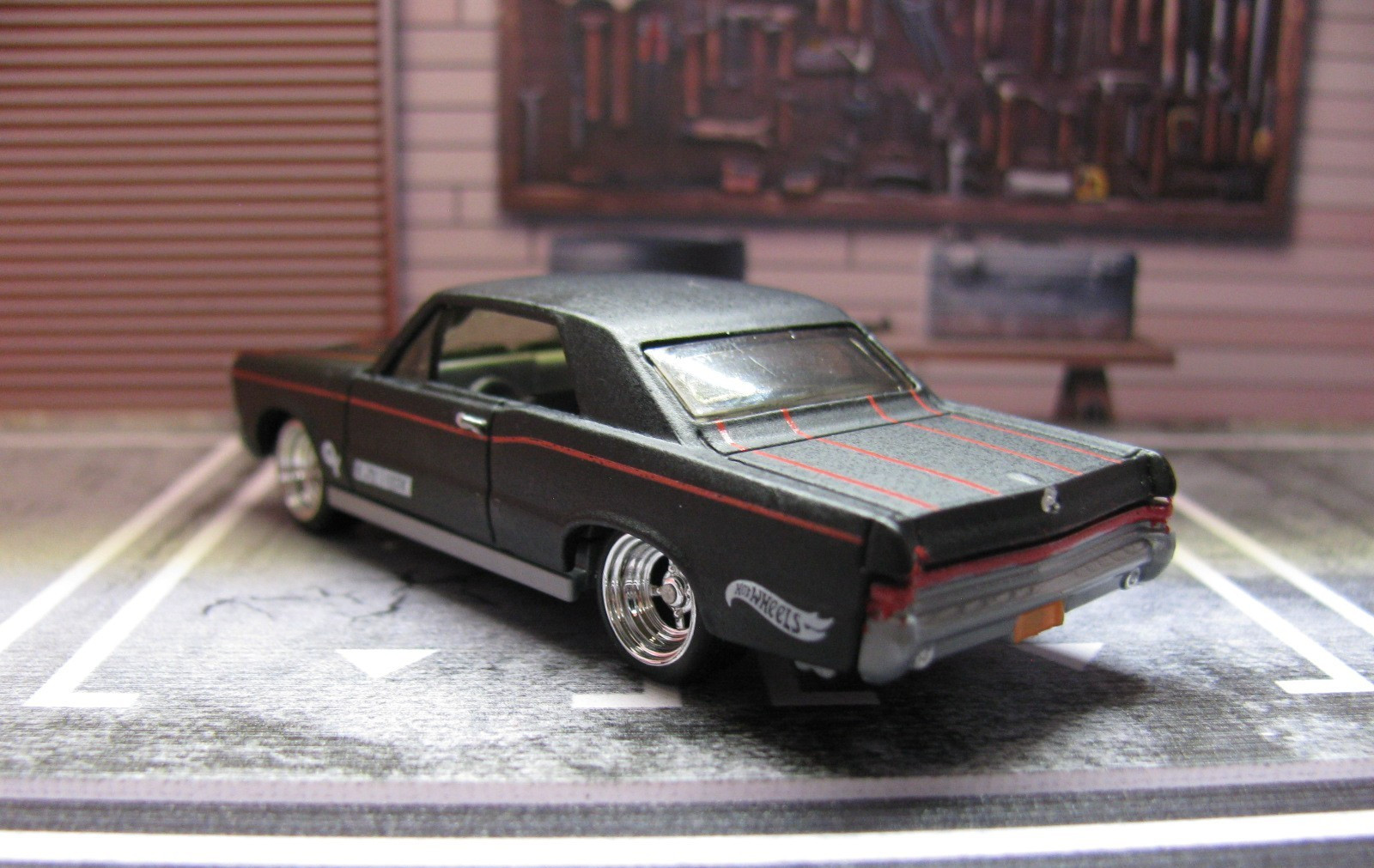 2026 Hot Wheels Matte Black/Red Stripes ’65 PONTIAC GTO w/Real Riders Wheel Swap
