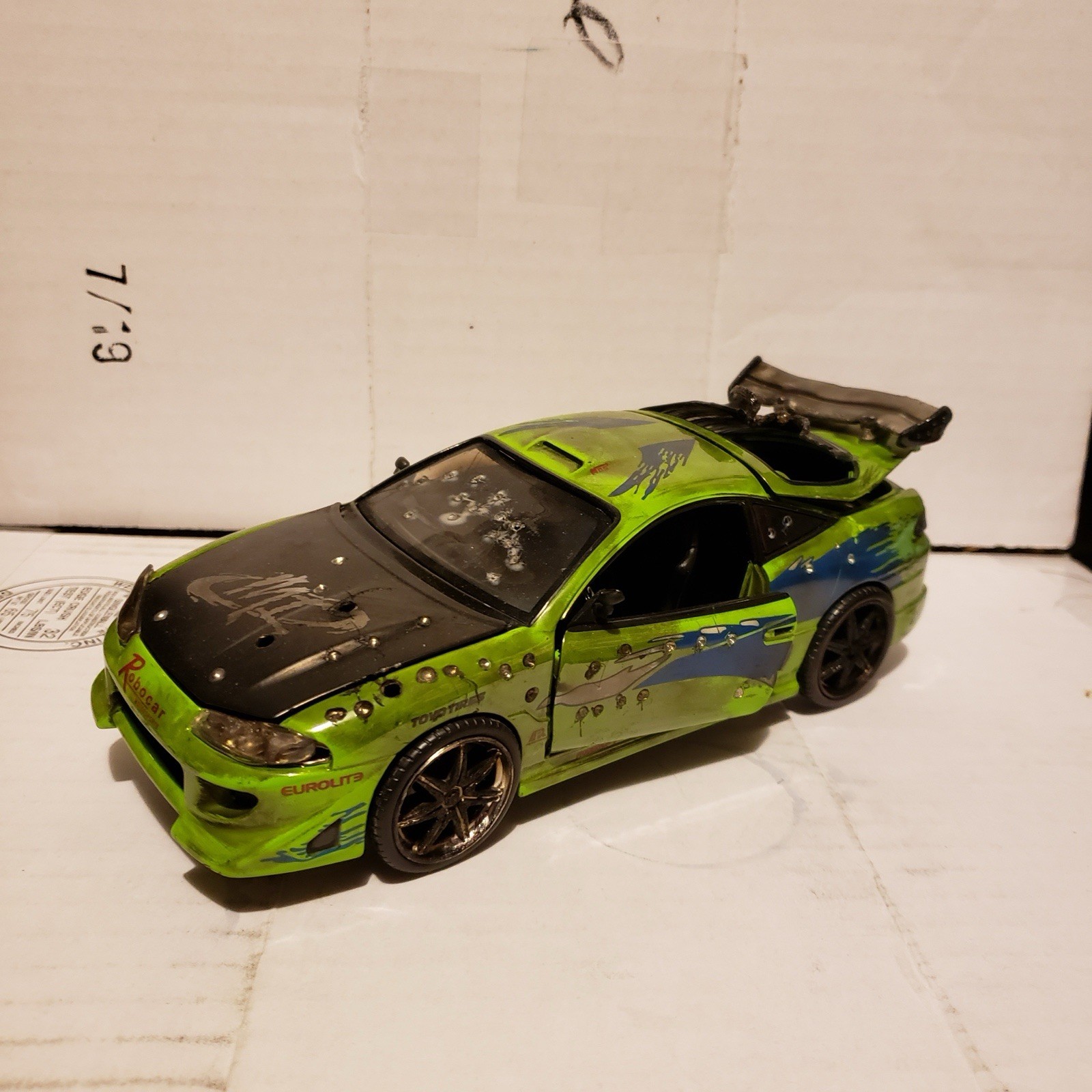 Jada Toys Tuned Diecast Model Car Green/Black/Blue w/ Large Rear Wing