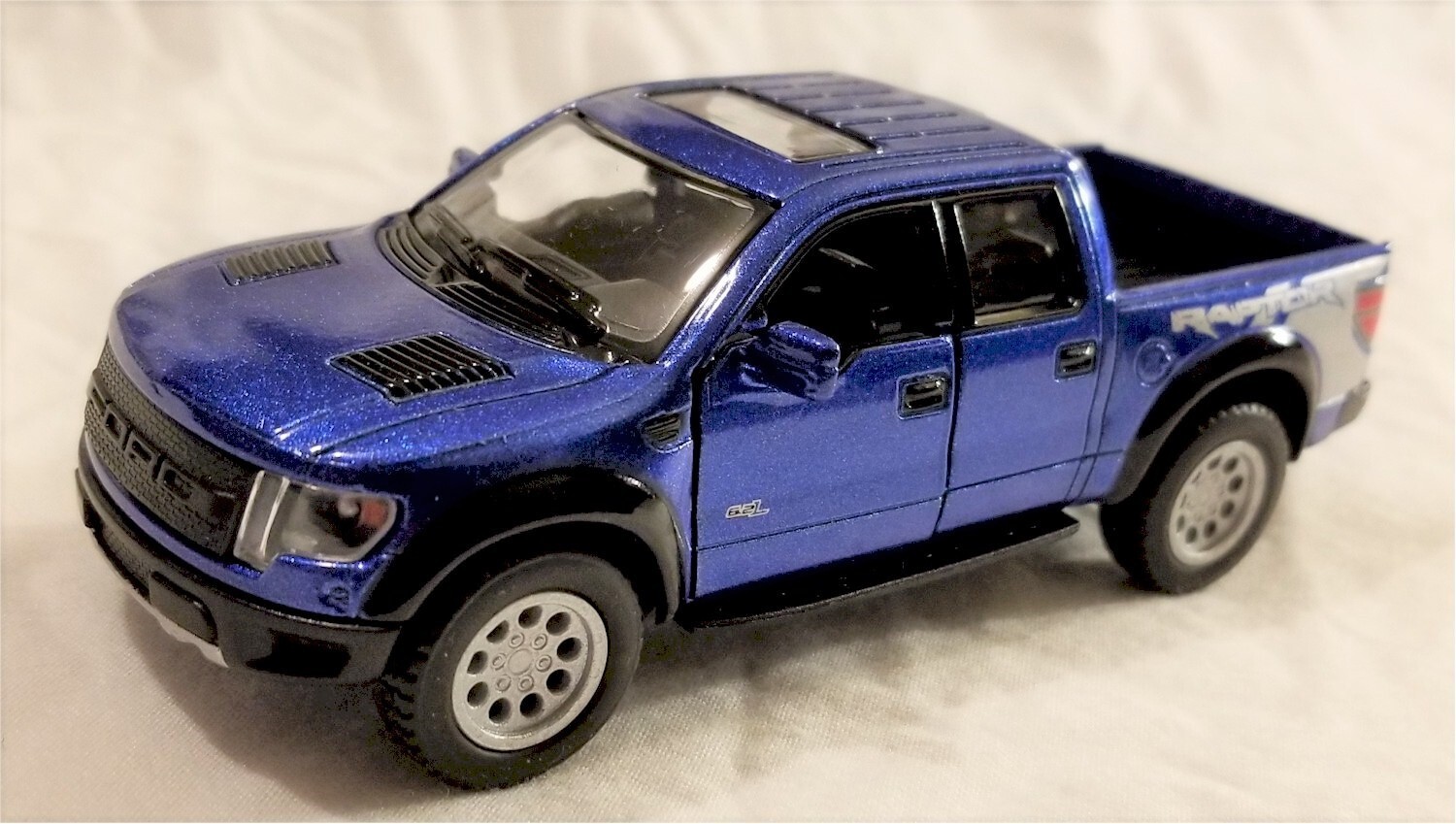 Kinsmart – 1:46 Scale 2013 Ford F-150 SVT Raptor SuperCrew Blue (BBKT5365DBL)