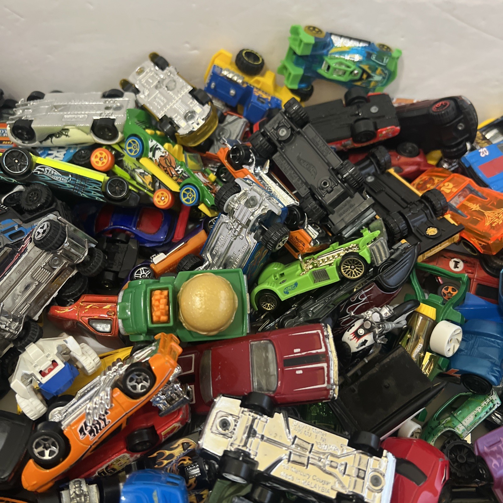 30 LBS Pounds of pure hotwheels. There are many different years and castings.