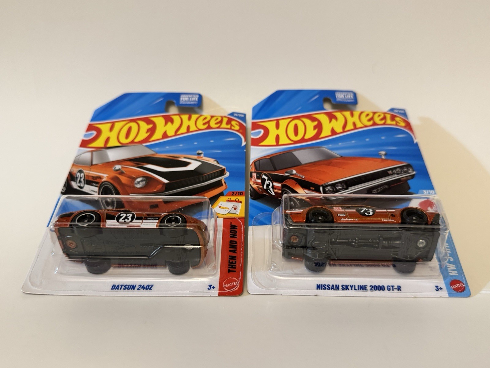 Hot Wheels JDM Nissan Skyline 2000GT-R + Fairlady Z Orange Then & Now – LOT OF 2