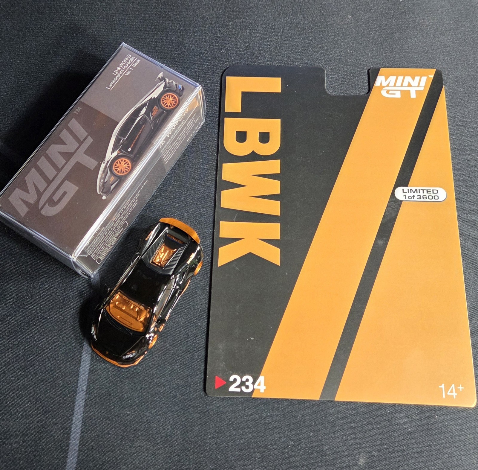 Mini GT #234 CHASE – LB Works Lamborghini Huracan Black & Bronze – See Photos