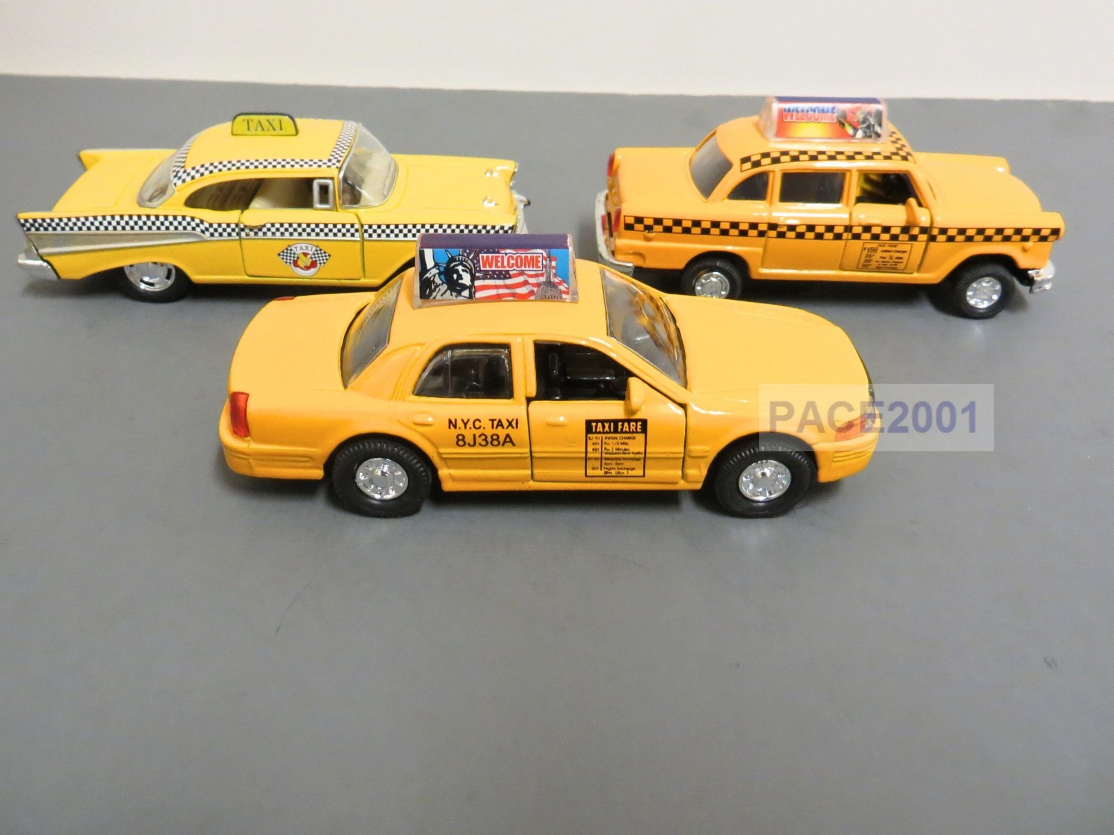 Lot of 3 Diecast Taxies with Pullback Action (57 Bel Air, Classic and Modern)