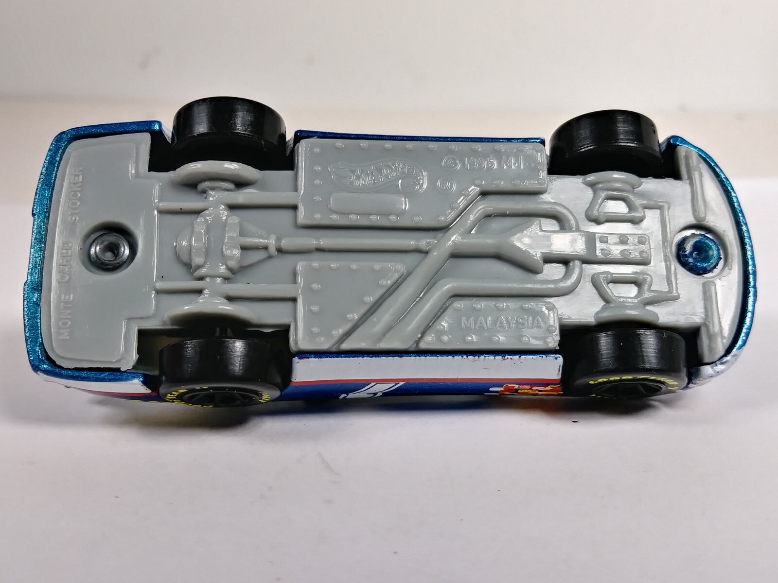 Lumina Stocker Hot Wheels 1995 Race Team Series Dark Blue 7SP Rims 1:64 Loose