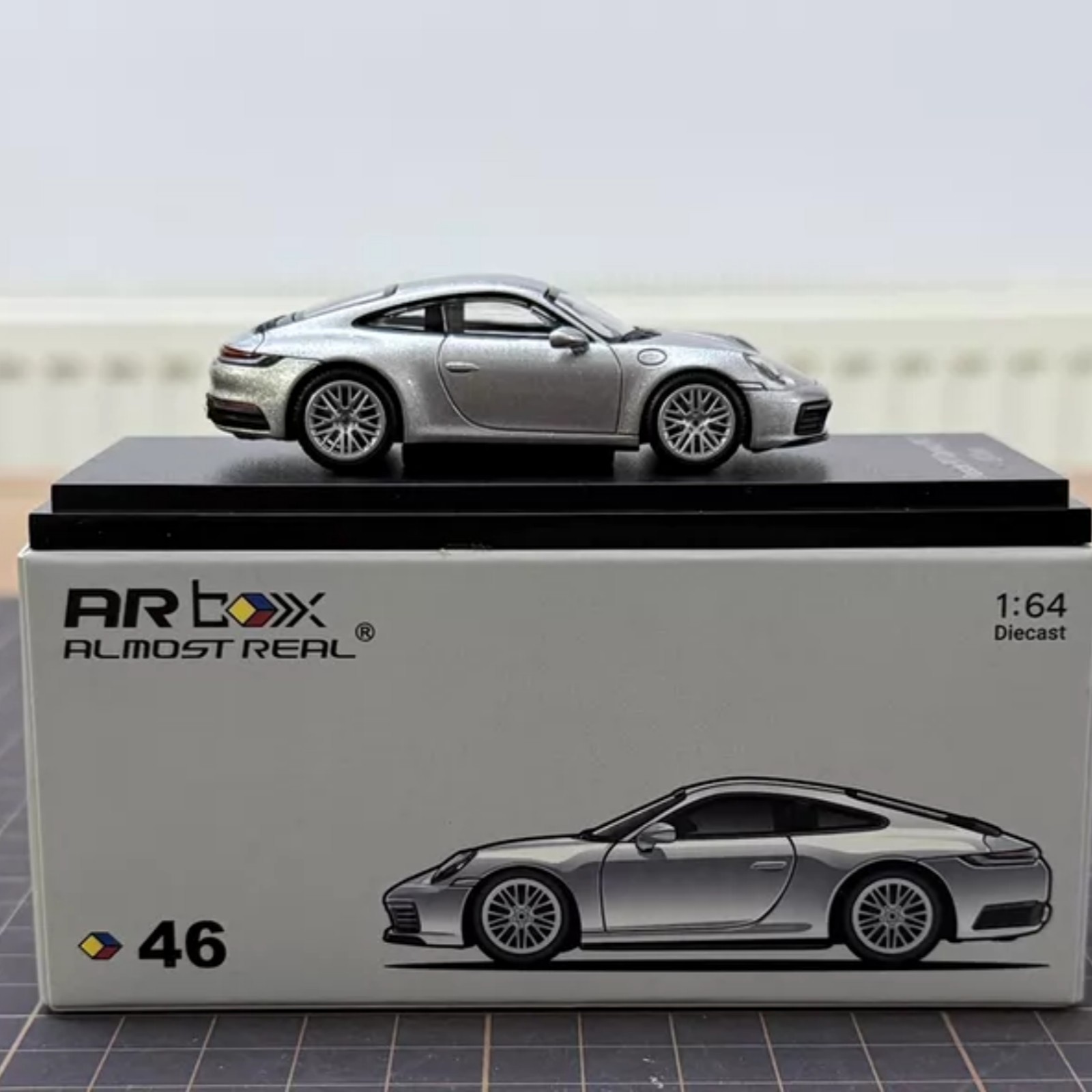 2026 Almost Real 1/64 Porsche 911 Carrera 992.1 GT Silver Metallic Diecast Model