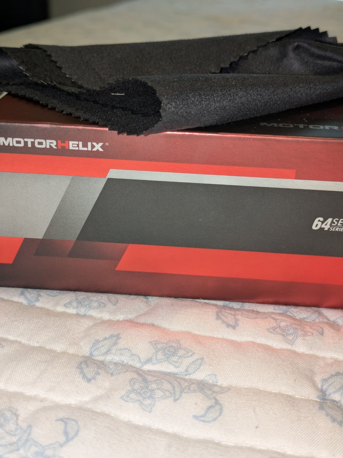 Motorhelix Nissan R34 Red 1;64 Diecast