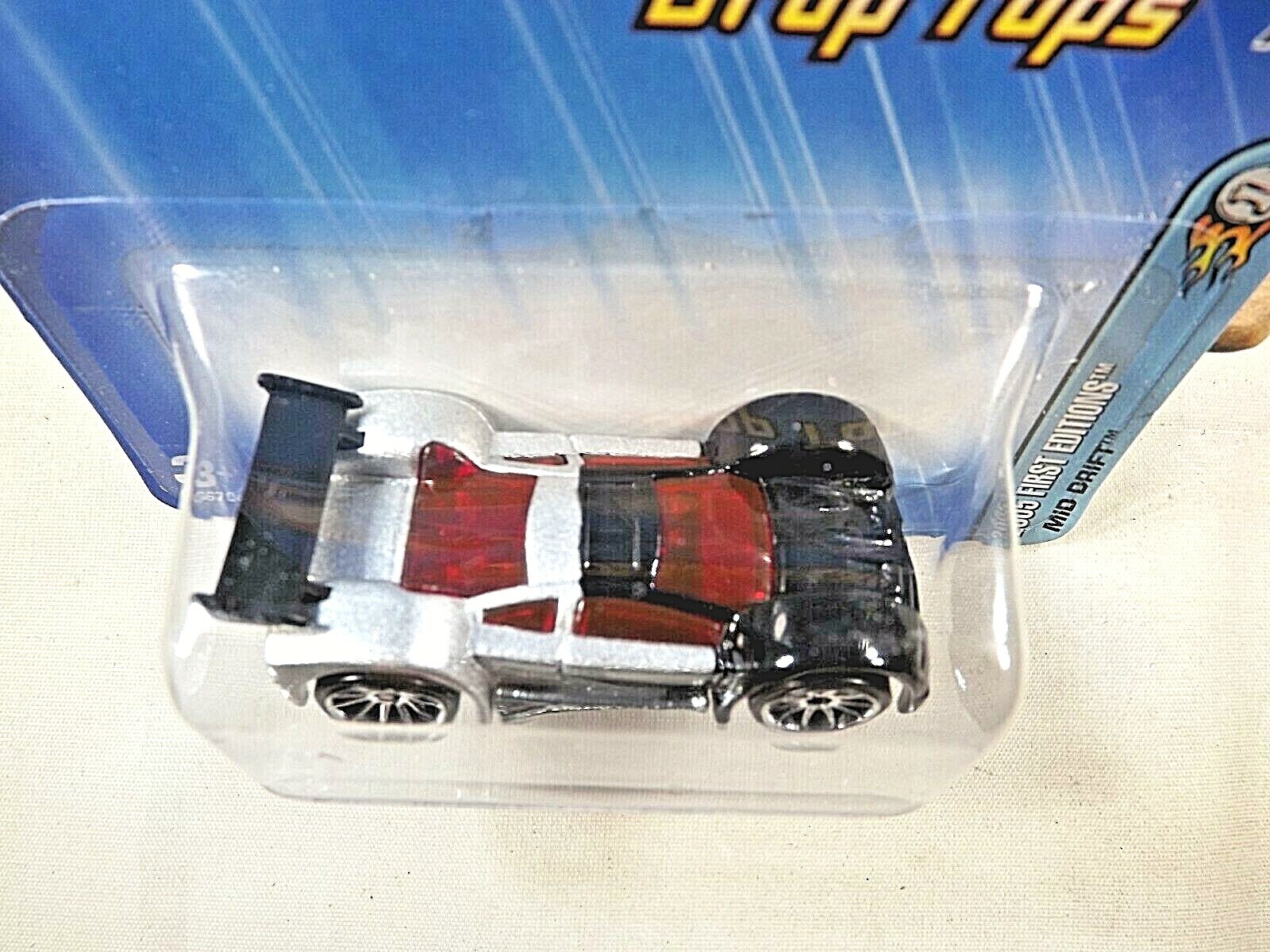 2005 Hot Wheels #27 First Edition-Drop Tops 7/10 MID DRIFT Silver-Black w/10 Sp