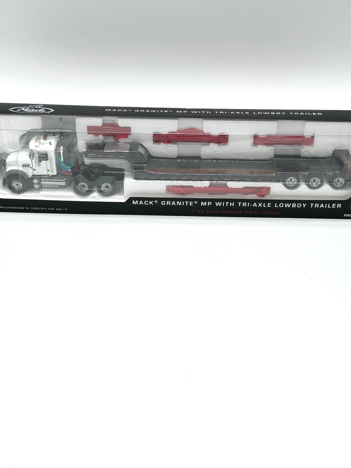White & Black Mack Granite MP Truck w/Tri Axle Lowboy By First Gear 1/50th Scale