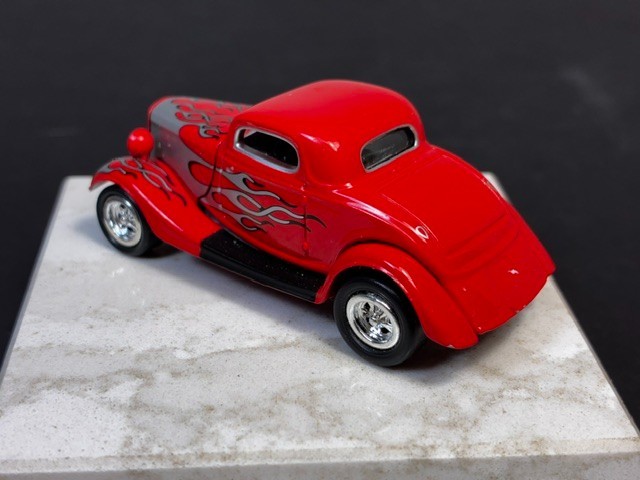 Johnny Lightning ’34 Ford Custom Coupe. 1:64 DIECAST. 2000. Red w/ Silver Flames