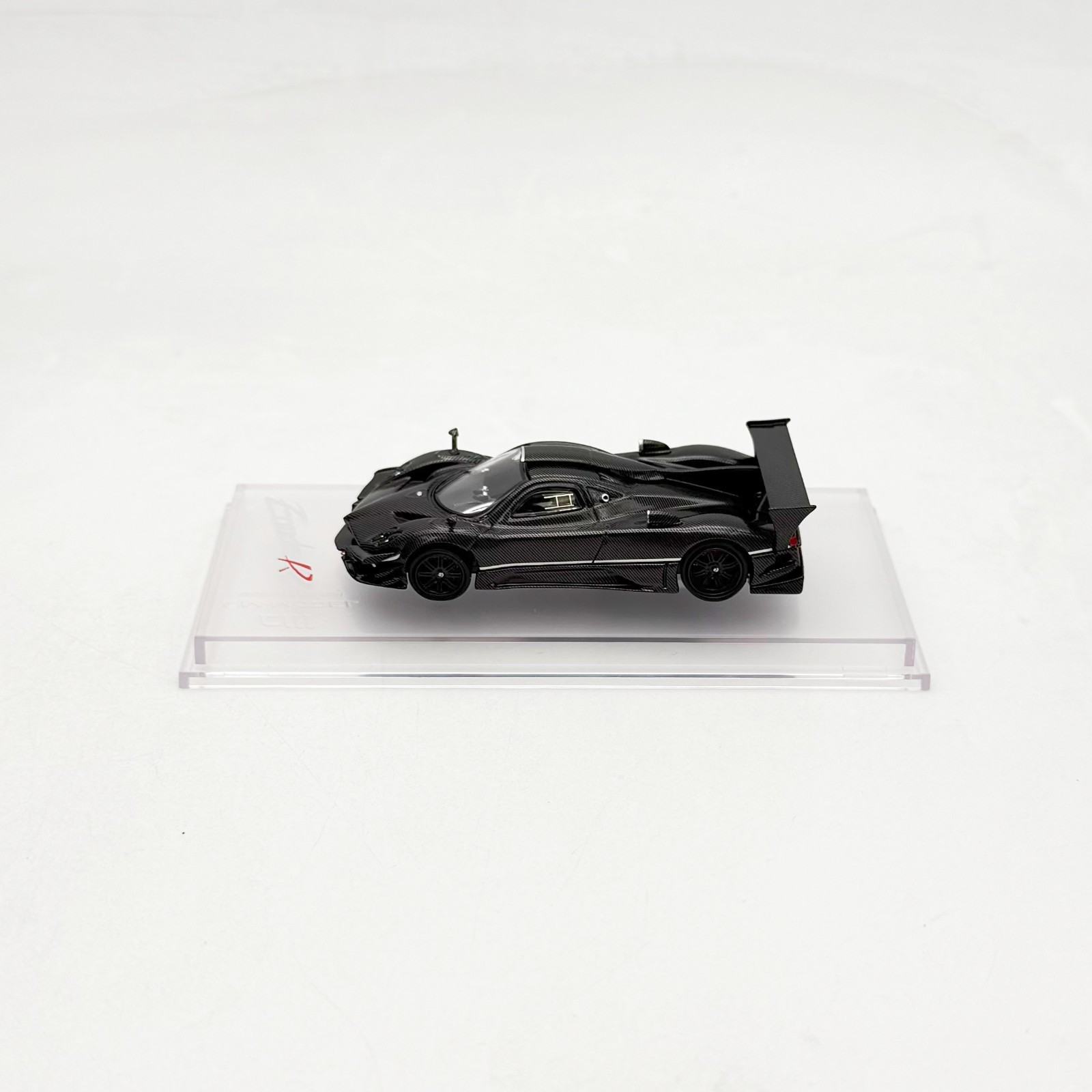 CM Model 1:64 Pagani Zonda Revolucion – Black Full Carbon – With Extra Wheels