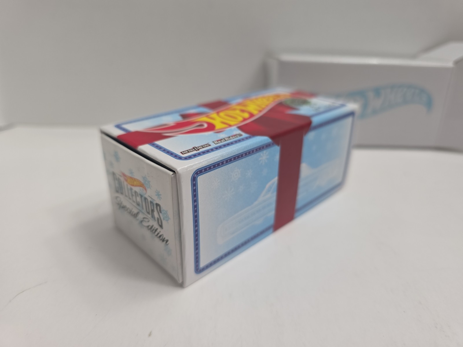 Hot Wheels 2021 RLC Holiday Snowman Chevy ’64 Impala – Spectraflame Light Blue