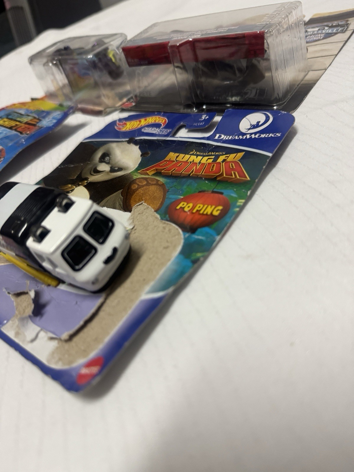 hot wheels mix lot of 4- see photos please-damaged package-new never used