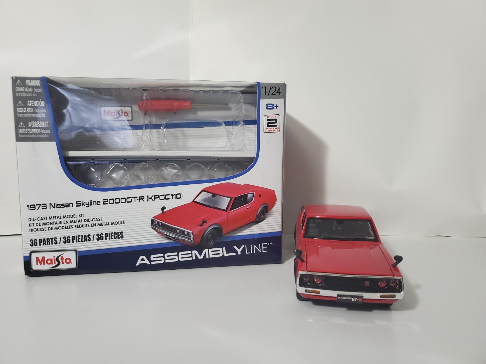 1-24 Maisto Assembly Line Die Cast Metal 73 Nissan Skyline New Build Super Nice