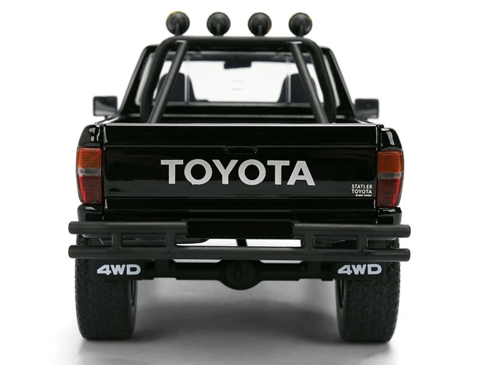 1985 TOYOTA SR5 PICKUP BLACK W/SKATEBOARD “BACK TO THE FUTURE” 1/24 JADA 36479