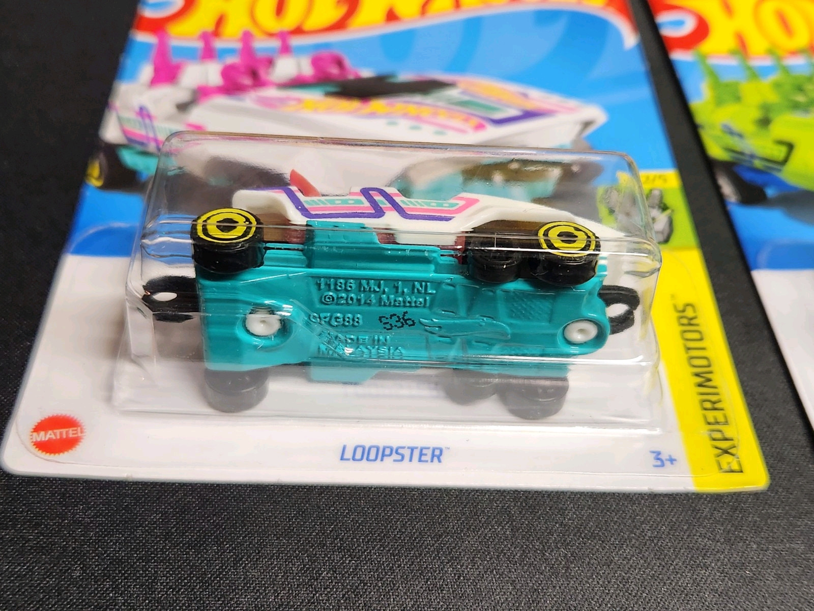Hot Wheels 2024 Loopster – White 48/250 – Experimotors 2/5 – Hands Up – Coaster