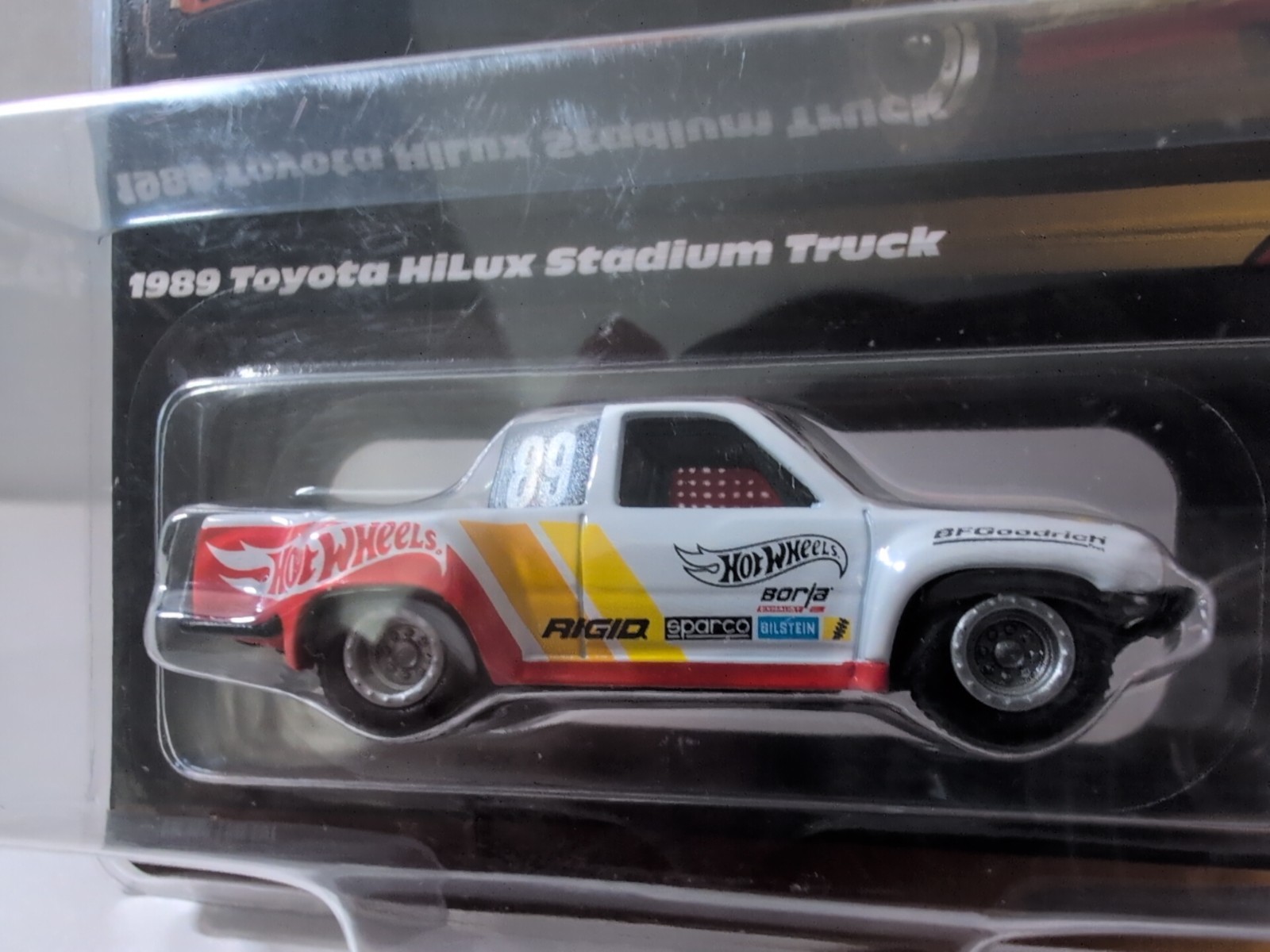2024 Hot Wheels Elite 64 1989 Toyota Hilux Stadium Truck With Protector NEW!