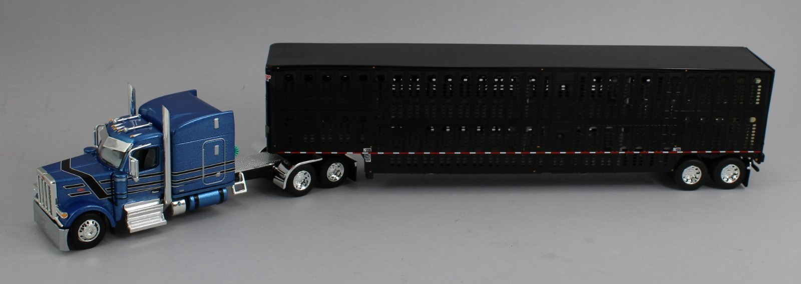 DCP 1:64 *BLUE & BLACK* Peterbilt 589 Midroof w/BLACK Wilsn Livestock Trailer
