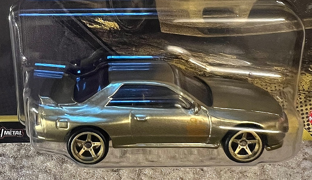 Hot Wheels Premium Vintage Racing Nissan Skyline GT-R (BNR32) Gold Chase