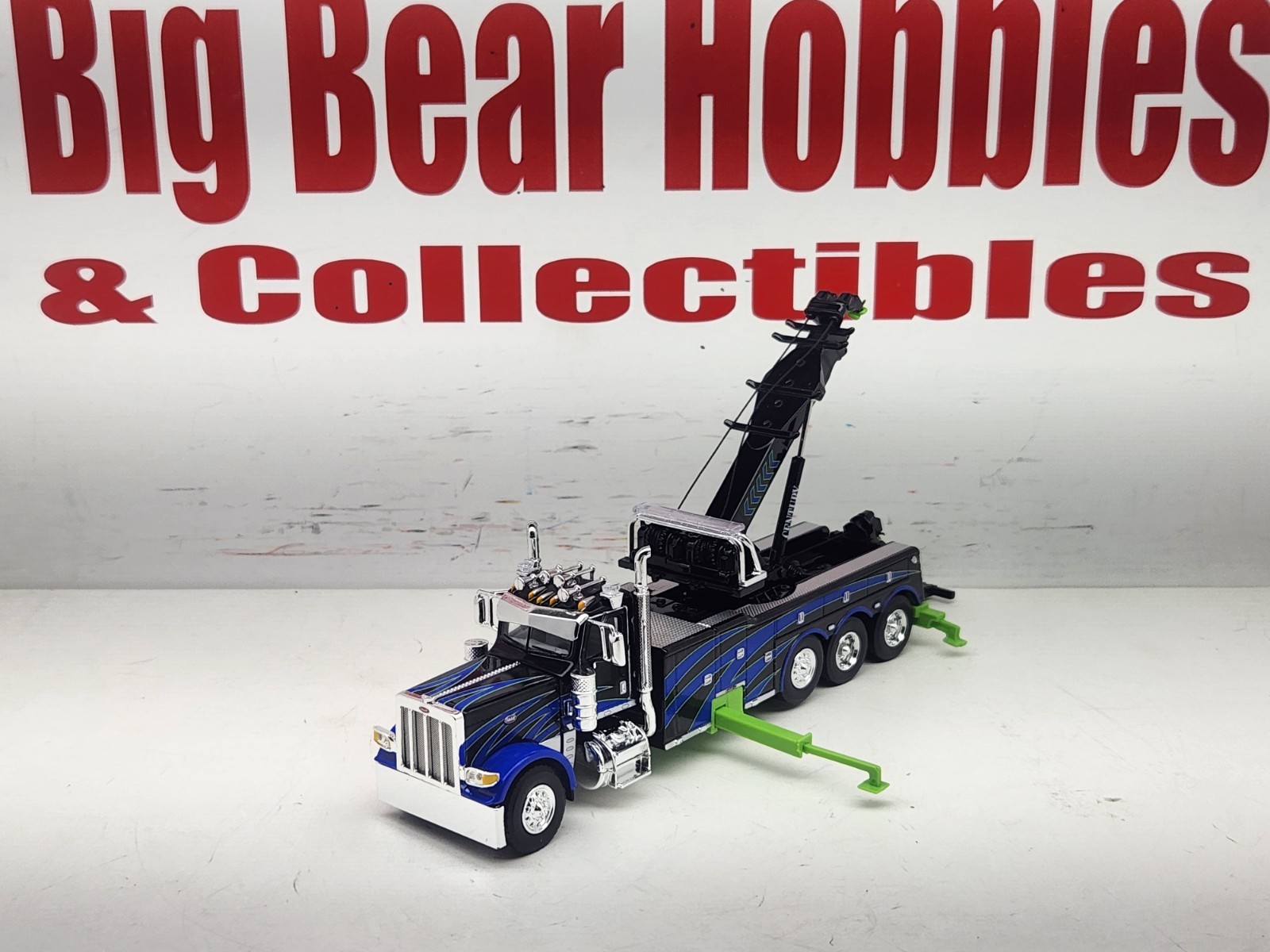 1/64 DCP/FG #60-2248 Black, Blue, & Green 389 DC Peterbilt Century 1150 Rotator