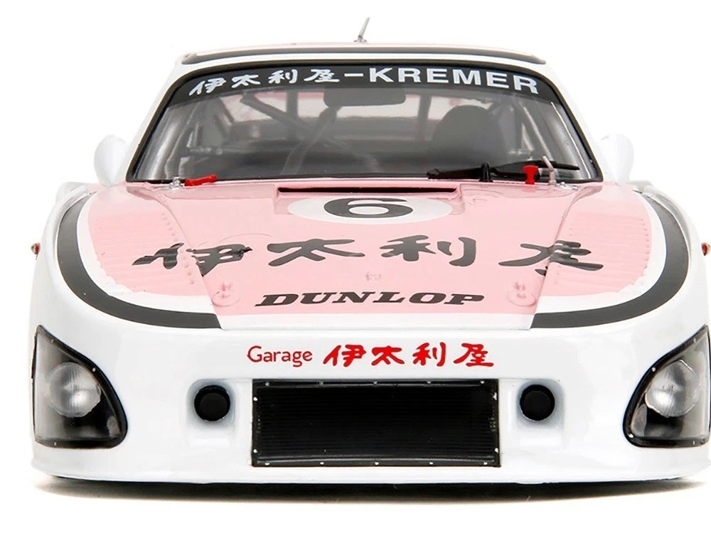 Jada 1:18 1981 Porsche 935 K3 – 1000KM Suzuka 1981 White/Pink Model Car 36386-7B