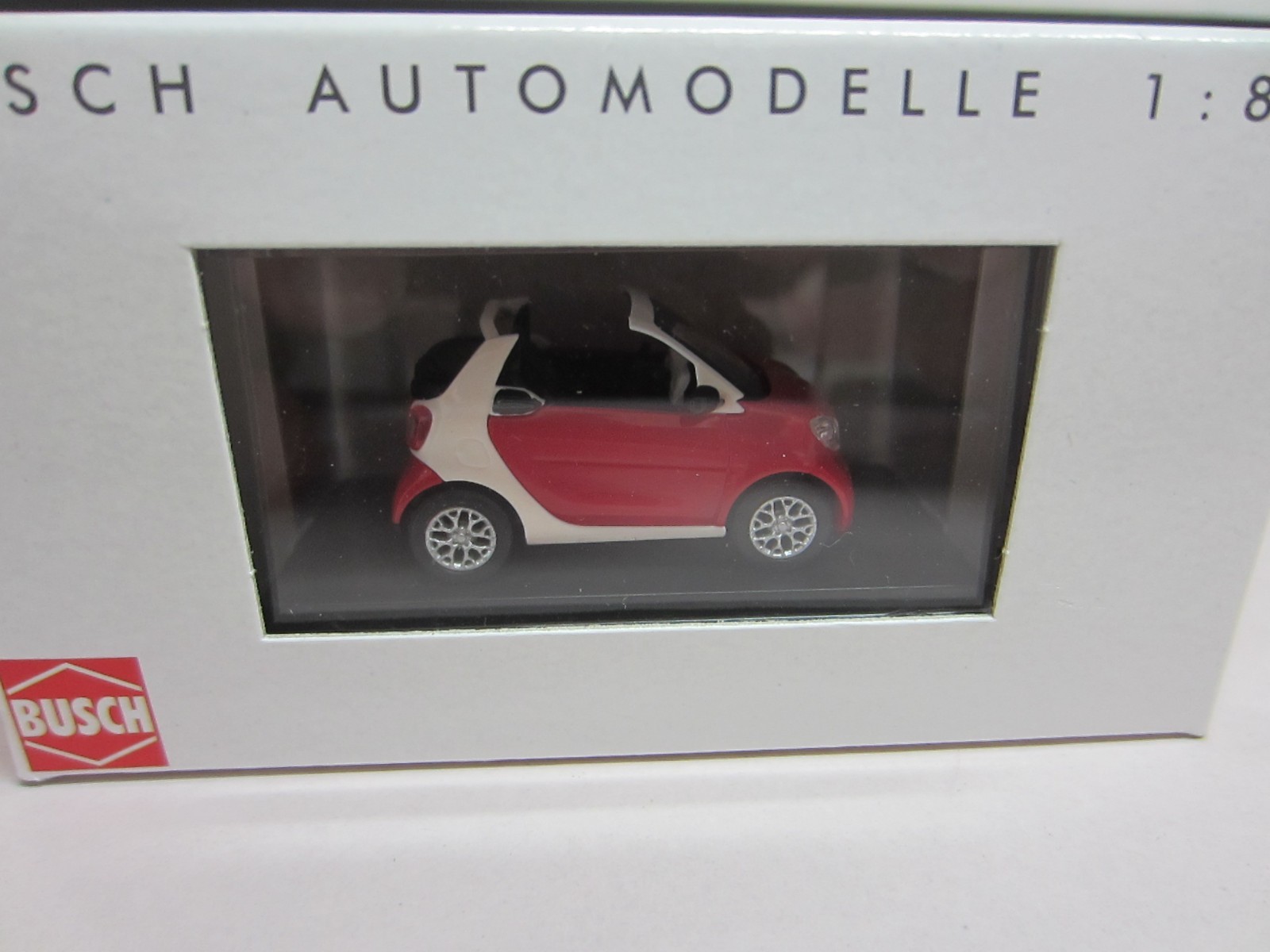BUSCH 50778 SMART FORTWO CABRIO 2015 in RED – model is PLASTIC – HO / 1:87 scale