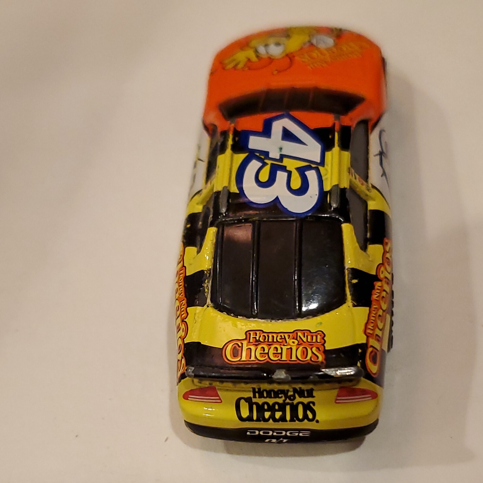 Hot Wheels Honey Nut Cheerios #43 Race Car. Please see photos of actual item for